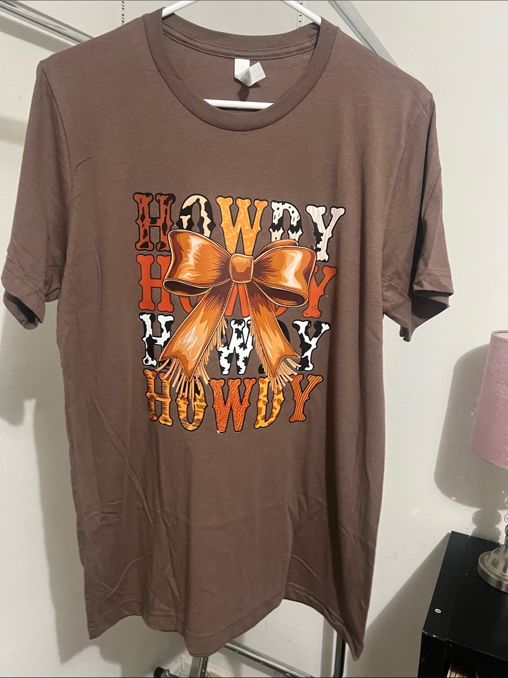 Bella Canvas Brown Tee with Orange Bow and Multi-Pattern HOWDY Graphic